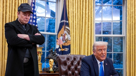 Elon Musk listens as US President Donald Trump speaks in the Oval Office of the White House in Washington, DC.(AFP)