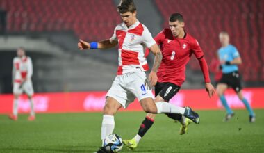 Luka Vuskovic of Croatia in action against Giorgi Kvernadze of Georgia during the UEFA Under-21 Championship Play-Off First Leg match between Georg...