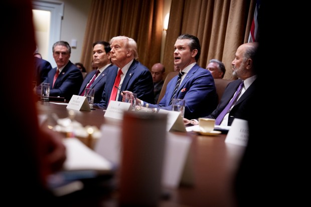 Defense Secretary Pete Hegseth (2nd-R) accompanied by U.S. President Donald Trump, speaks during a Cabinet meeting at the White House on February 26, 2025 in Washington, DC. (Photo by Andrew Harnik/Getty Images)