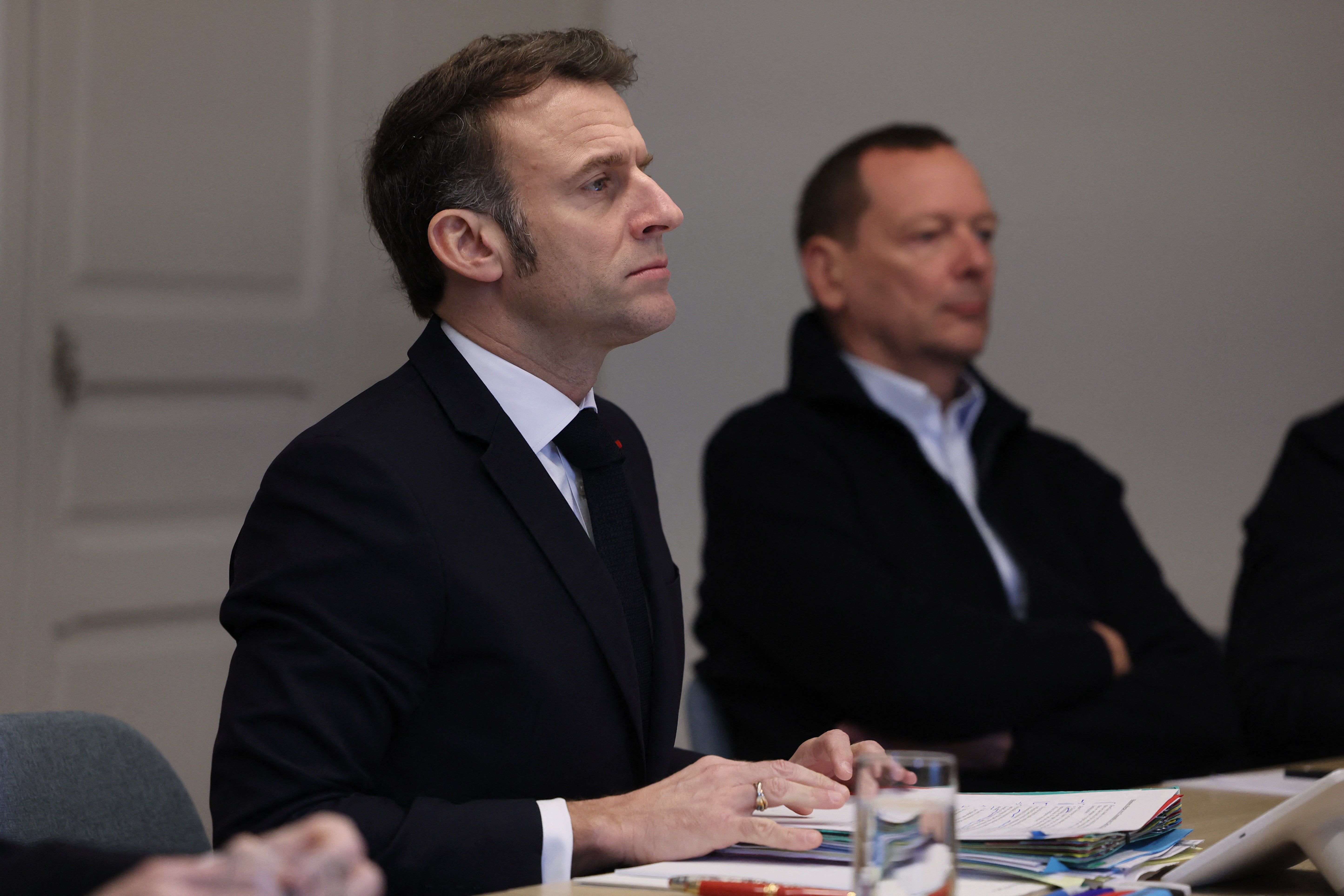 French President Emmanuel Macron attends a videocall as he takes part in a virtual summit held by Britain's prime minister and focused on peace and security in Ukraine, at the Elysee Palace in Paris