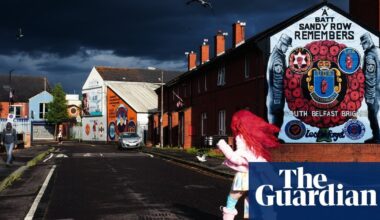 Flame-haired defiance by a Belfast mural: Hannah Starkey’s best photograph