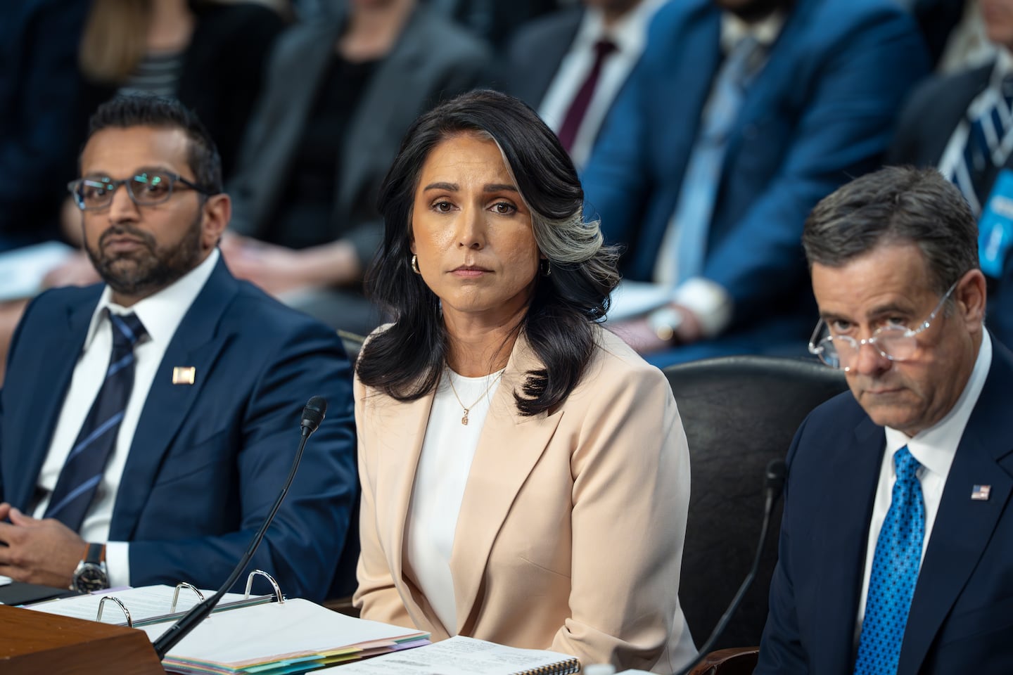 Director of National Intelligence Tulsi Gabbard, center, is flanked by FBI Director Kash Patel, left, and CIA Director John Ratcliffe, as the Senate Intelligence Committee holds its worldwide threats hearing, on Capitol Hill in Washington, on March 25.