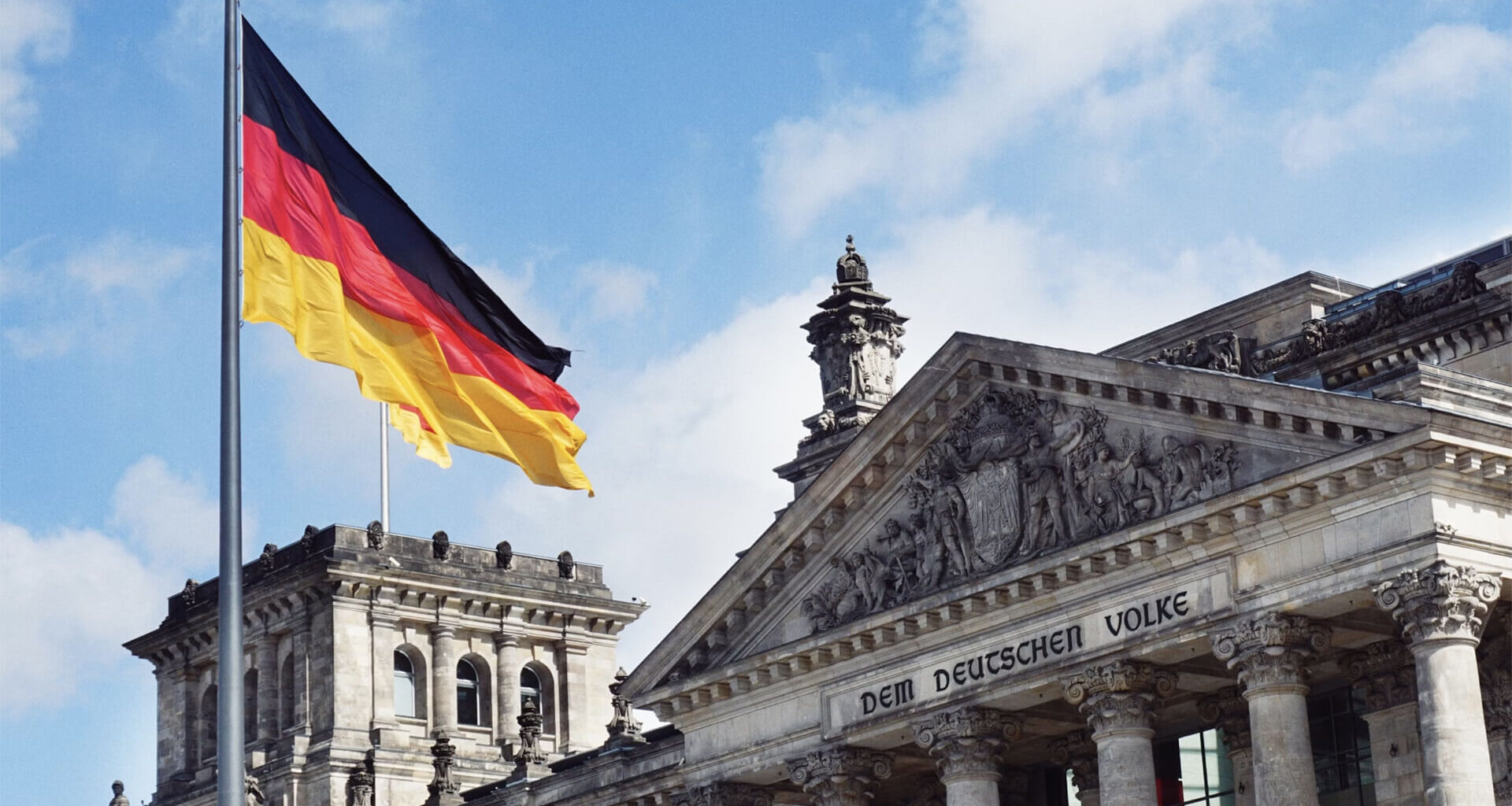 Photo of German flag in front of their parliment