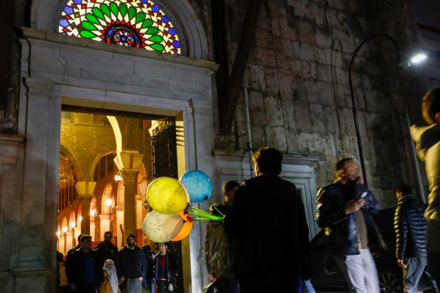 FILE.- Worshippers exit the Umayyad Mosque after prayers on the...