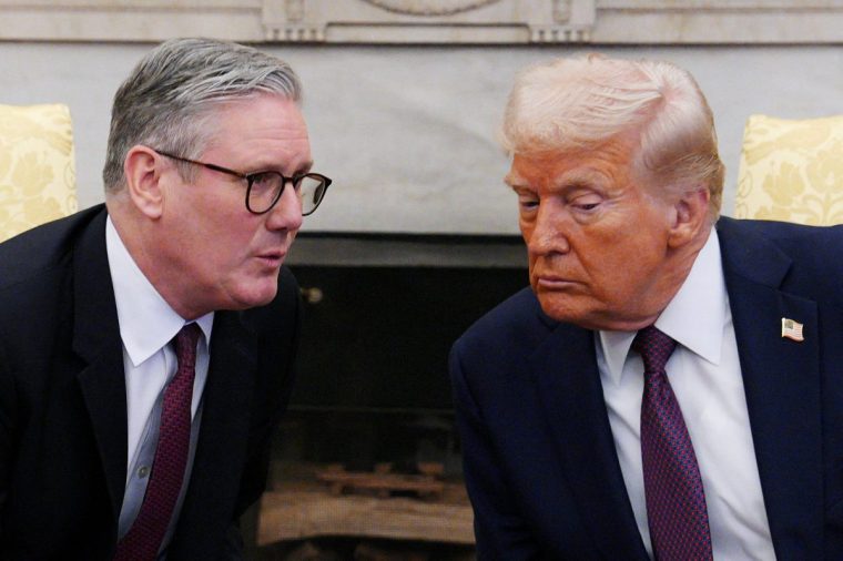 FILE PHOTO: British Prime Minister Keir Starmer meets with U.S. President Donald Trump in the Oval Office at the White House on February 27, 2025 in Washington, D.C., U.S. Carl Court/Pool via REUTERS/File Photo