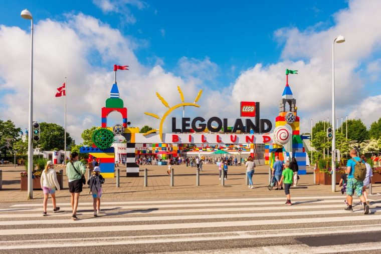 Billund, Denmark - June 28, 2022: Entrance to Legoland Amsument Park in Billund, Denmark. Legoland opened on 7 June 1968 and attracts about 2 million visitors annually, making it the largest tourist attraction in Denmark outside Copenhagen. Lego is a line of plastic construction toys that are manufactured by The Lego Group since 1949.