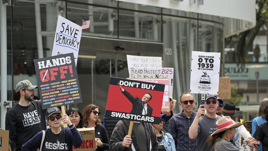 Anti-Musk protests outside Tesla dealerships across the US took place, with people trying to further drive down the automaker's declining sales. (AP)
