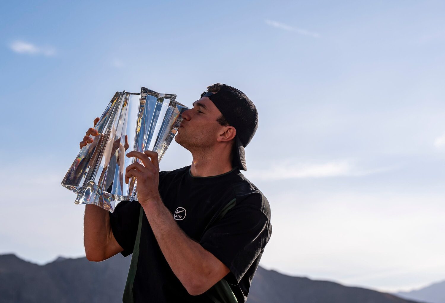2025 BNP Paribas Open Men's Singles Champion Jack Draper poses for a photo with the trophy after winning the event in Indian Wells, Calif., Sunday, March 16, 2025.