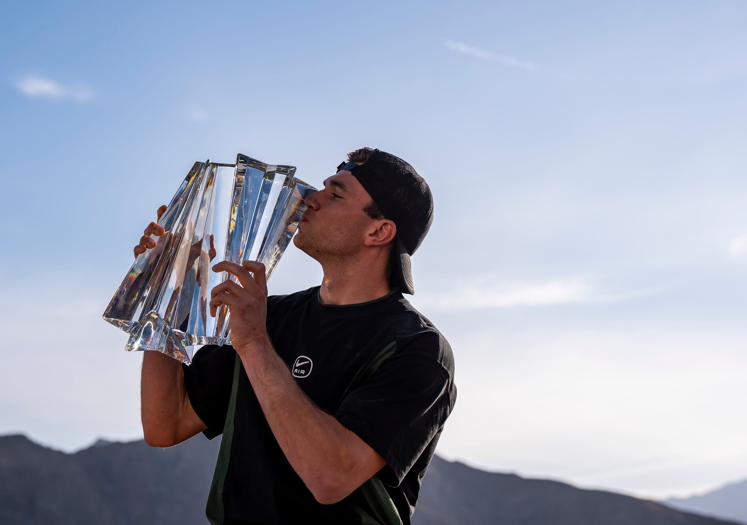 2025 BNP Paribas Open Men's Singles Champion Jack Draper poses for a photo with the trophy after winning the event in Indian Wells, Calif., Sunday, March 16, 2025.