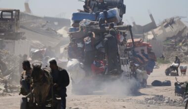 Displaced Palestinians, carrying their belongings traveling from Beit Hanoun to Jabaliya, a day after Israel's renewed offensive in the Gaza Strip, on March 19.