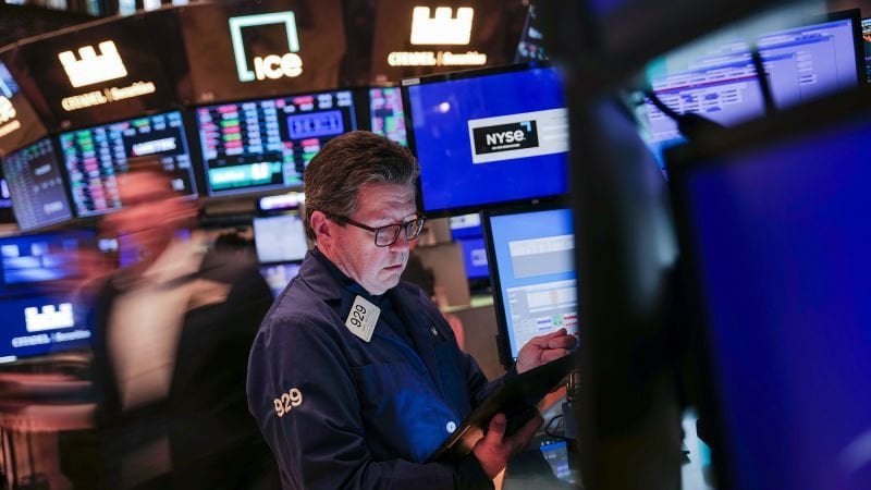 Dow falls by almost 900 points in market rout after Trump says he won’t rule out a recession