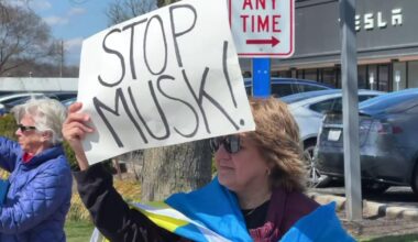 Protesters at Tesla dealership in New York decry Elon Musk, DOGE in peaceful rally