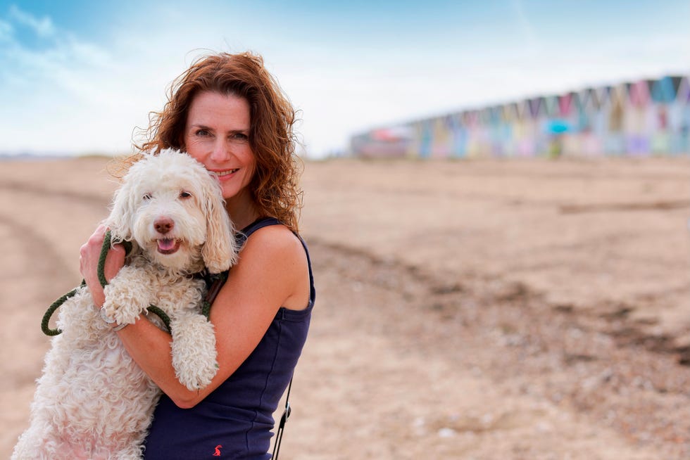 mersea island resident andrea bilton with her dog