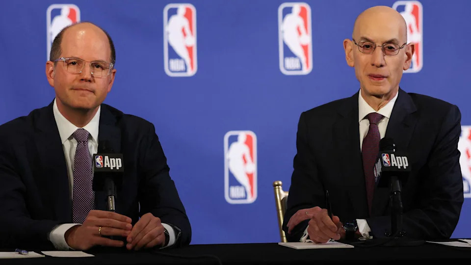 FIBA secretary general Andreas Zagklis (left) and NBA commissioner Adam Silver (R) speak during a press conference to announce the NBA's ongoing quest to further align with FIBA and expand its role in European basketball, in New York, on Thursday. (Photo by TIMOTHY A. CLARY / AFP)