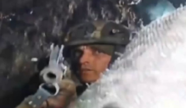 RU POV: Fiber-Optics FPV drone fails to explode after not having a direct impact, UAF soldier at the target location shoots at the drone with his rifle until it detonates.