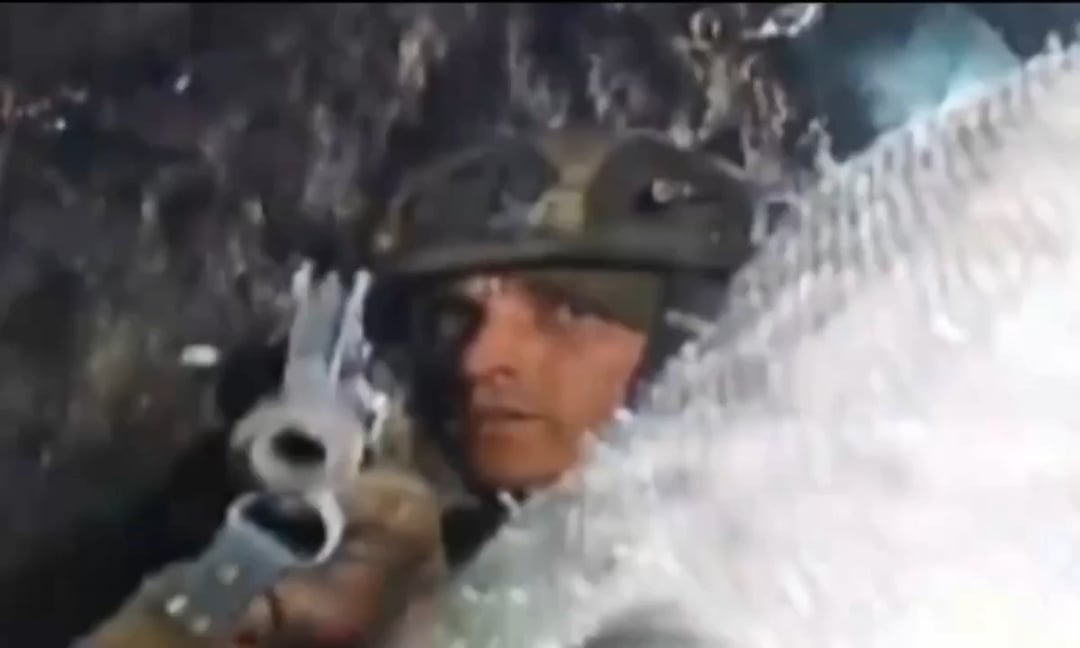 RU POV: Fiber-Optics FPV drone fails to explode after not having a direct impact, UAF soldier at the target location shoots at the drone with his rifle until it detonates.