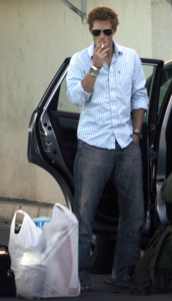 Prince Harry smoking a cigarette, saying goodbye to his girlfriend in Cape Town.