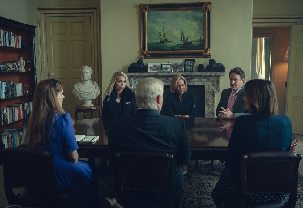 a group of people sitting in a room