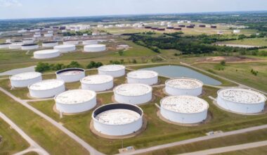 Oil holds near one-month high, set for third week of gains amid supply woes