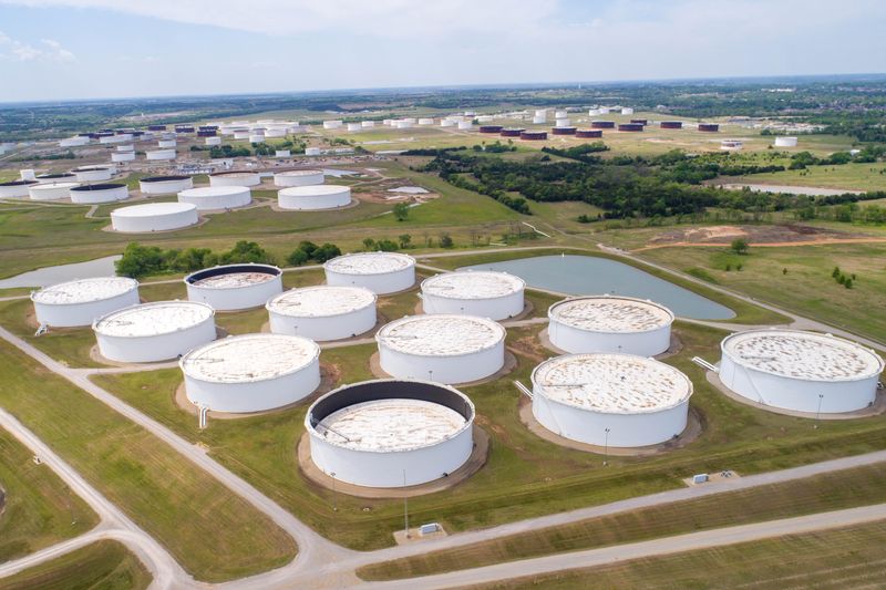 Oil holds near one-month high, set for third week of gains amid supply woes