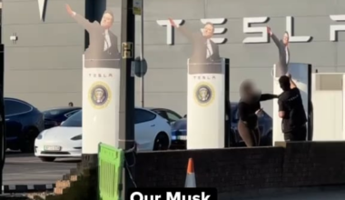 Elon Musk Cut Outs with Trump Seals Getting Taken Down in London