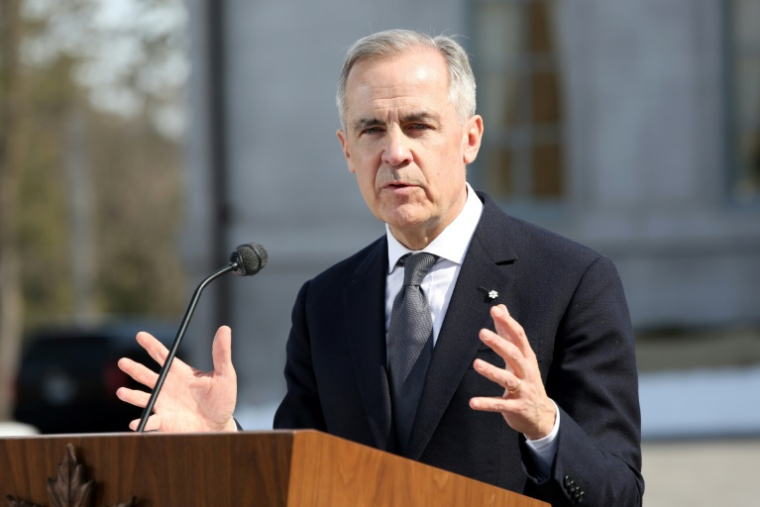 Le nouveau Premier ministre canadien Mark Carney lors de son premier discours officiel, le 14 mars 2025 à Ottawa ( AFP / Dave Chan )