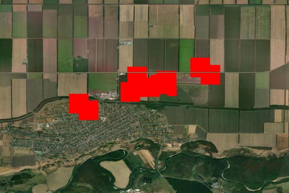 A screenshot of satellite imagery of Kavkazskaya oil pumping station in Krasnodar Krai, Russia, overlaid wth three large red areas representing heat from fire, mapped by NASA's FIRMS fire tracking service, as of March 25, 2025..