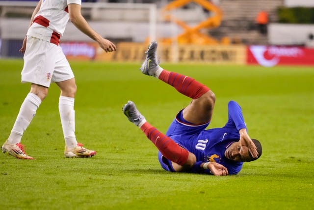 France’s Kylian Mbappe falls during the UEFA Nations League match against Croatia