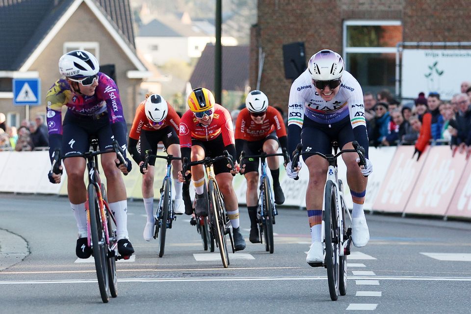 Lara Gillespie, right, (Team UAE Team ADQ) crosses the line just after Dutch rider Femke Gerritse, left, of Team SD Worx in the Fenix Omloop van het Hageland in Belgium. Photo: Getty