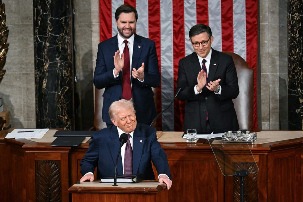 US Vice-President J.D. Vance (top left) and Speaker of the House Mike Johnson applaud as US President Donald Trump arrives to address a joint session of Congress in Washington on March 4. Photo: TNS