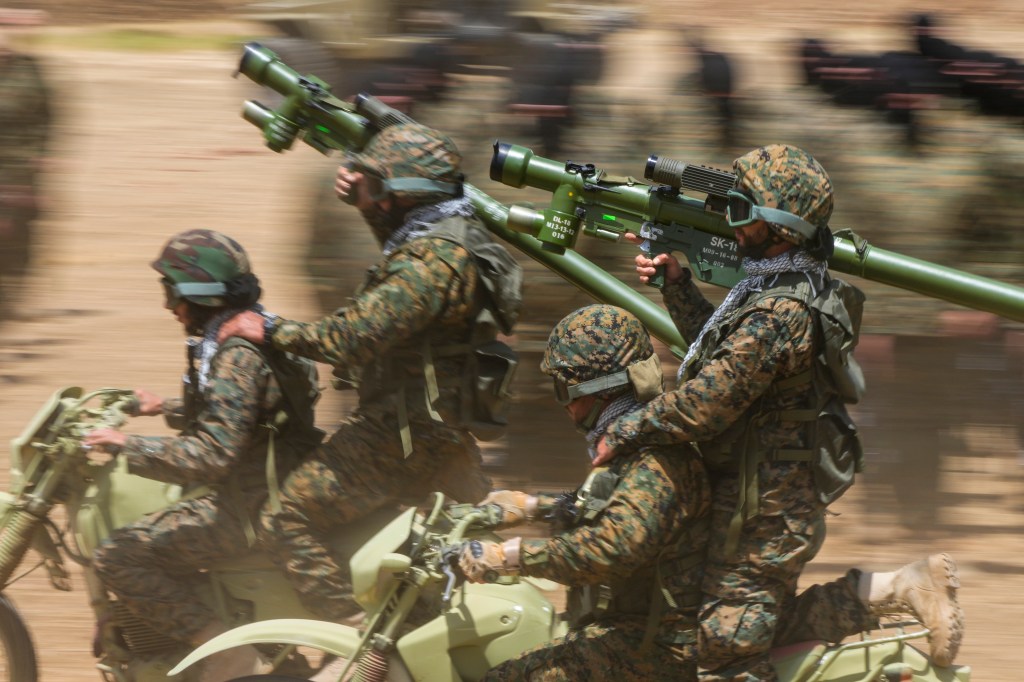 Hezbollah terrorists trail in southern Lebanon on May 21, 2023.