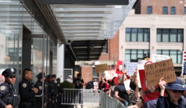 Protesters rally against Elon Musk at Tesla showrooms over the continued U.S. government purge