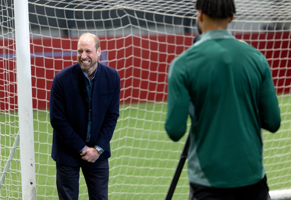 Prince William laughing at Aston Villa's training ground.