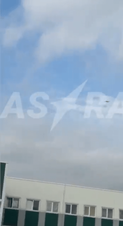 Astra logo in sky contrail.