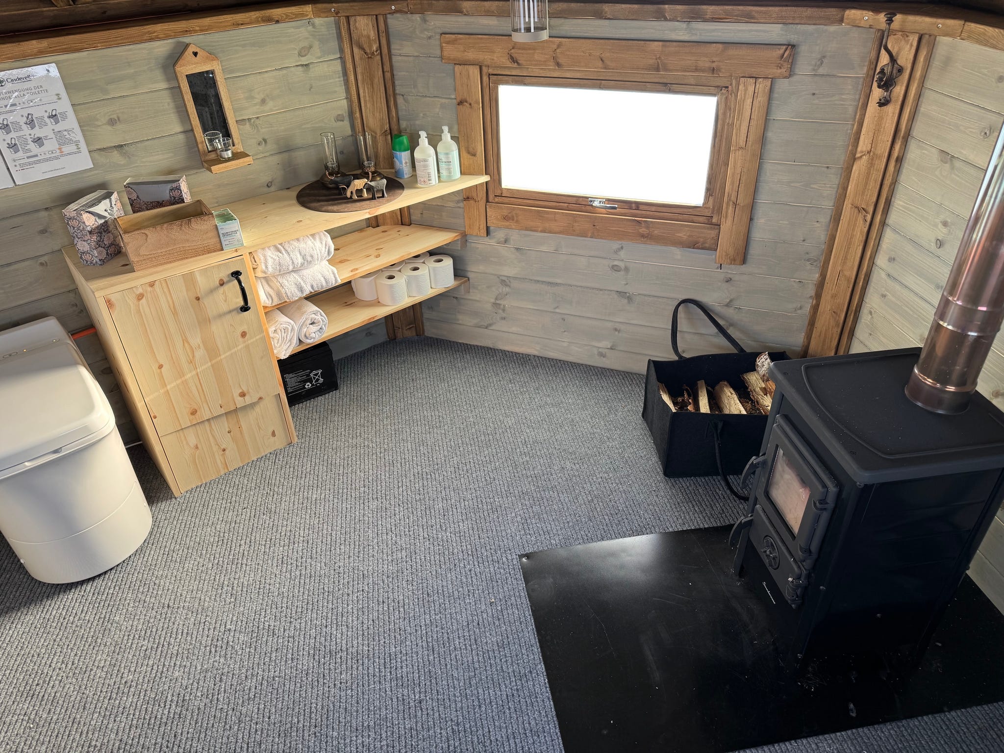 cozy interior space with storage and heating elements
