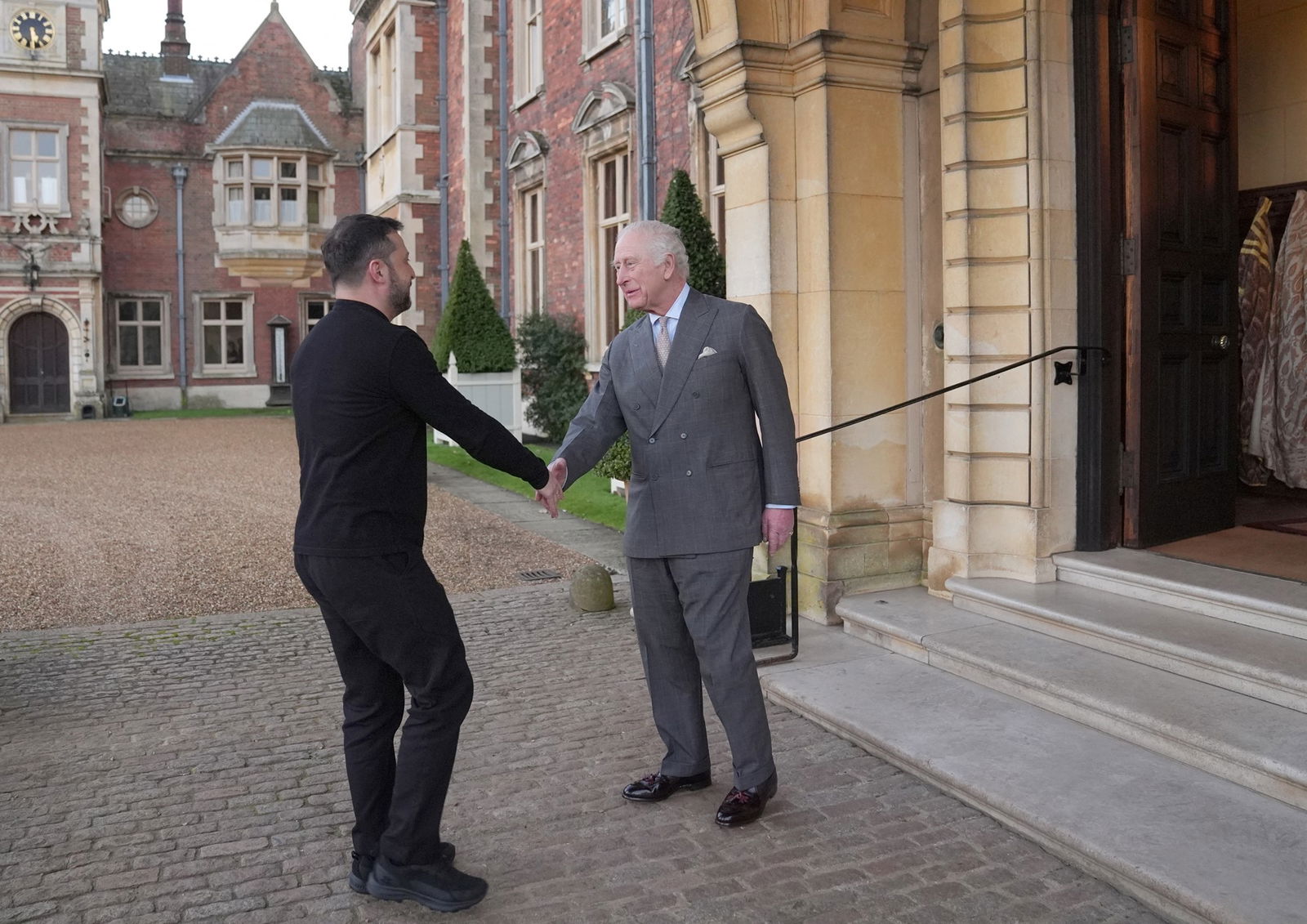 Volodymyr Zelenskyy shakes hands with King Charles