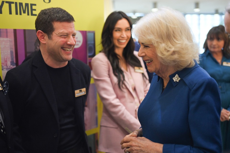 Queen Camilla meeting with television production crew.