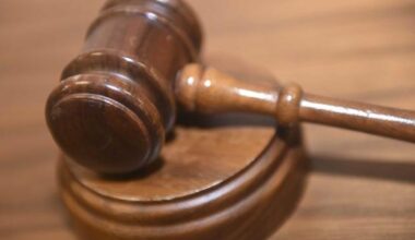 A gavel rests inside a court room