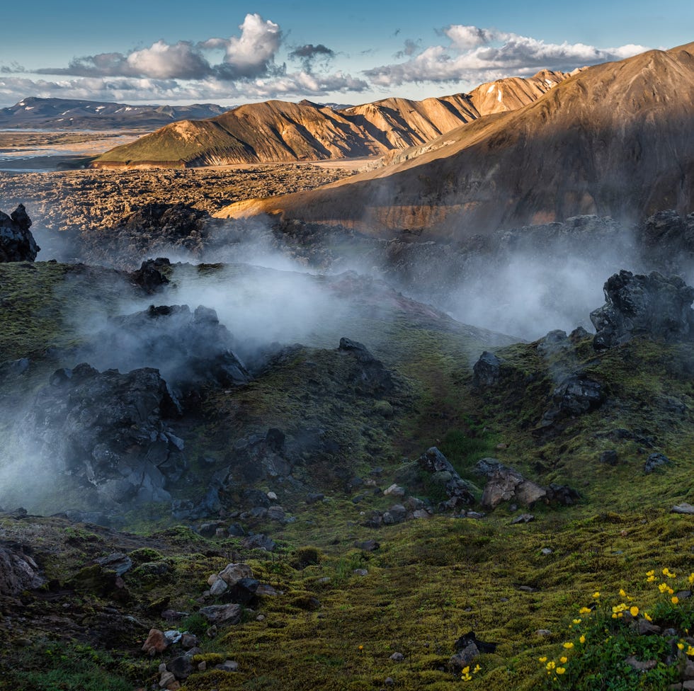 steam and gases rising from volcanic landscape at nesjavellir, landmannalaugar iceland