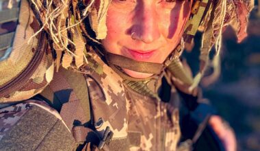 Ukrainian soldier with camouflage on her helmet - she is from the 93rd Brigade Special Rifle Battalion - within the 93rd Separate Mechanized Brigade Kholodnyi Yar - of the Ukrainian Army.