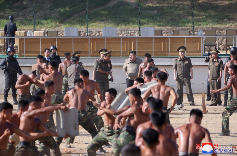 Kim Jong-un observing North Korean special forces training.