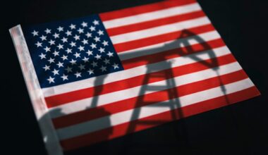 Shadow of an oil pump on the American flag, symbolizing how energy abundance isn't a climate strategy