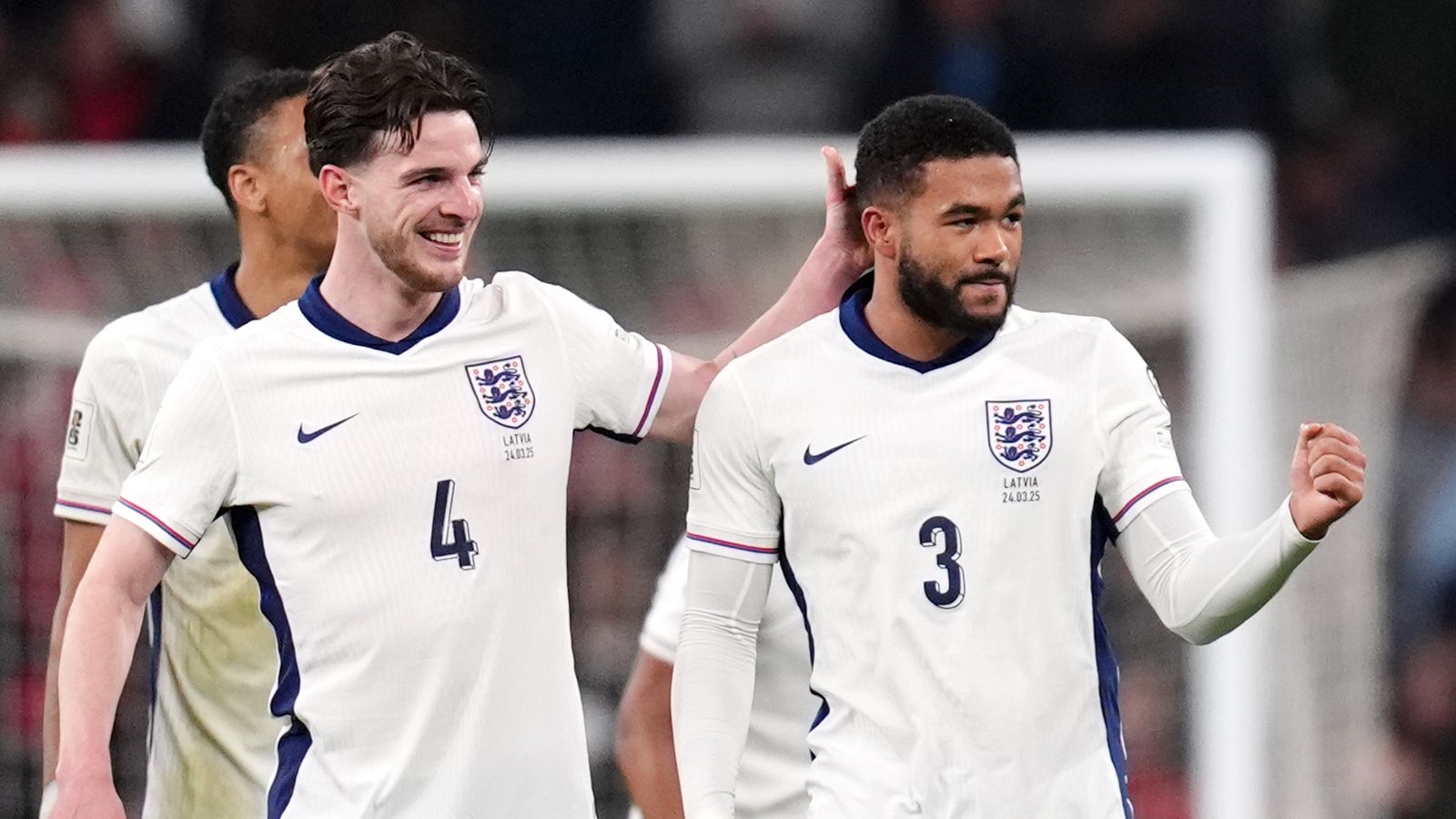 England's Reece James (right) celebrates with team-mate Declan Rice after scoring against Latvia