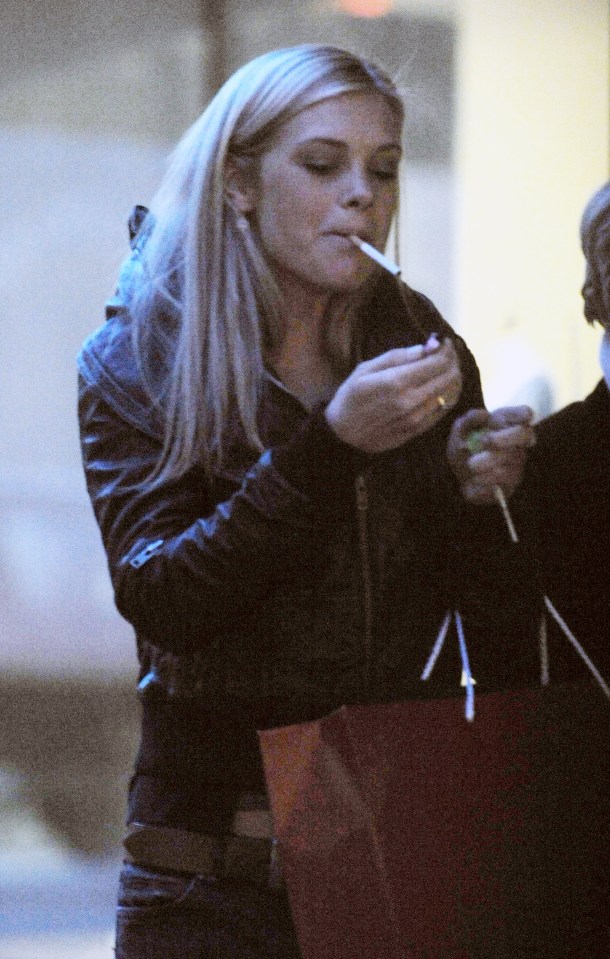 Chelsy Davy, Prince Harry's girlfriend, lighting a cigarette.