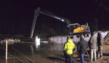 US and Lithuanian forces struggle to drain swamp to recover 4 soldiers in submerged armored vehicle