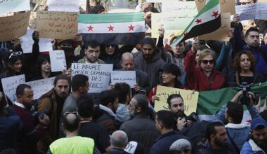 Syria's neighboring foreign ministers urge lifting sanctions, reconciliation