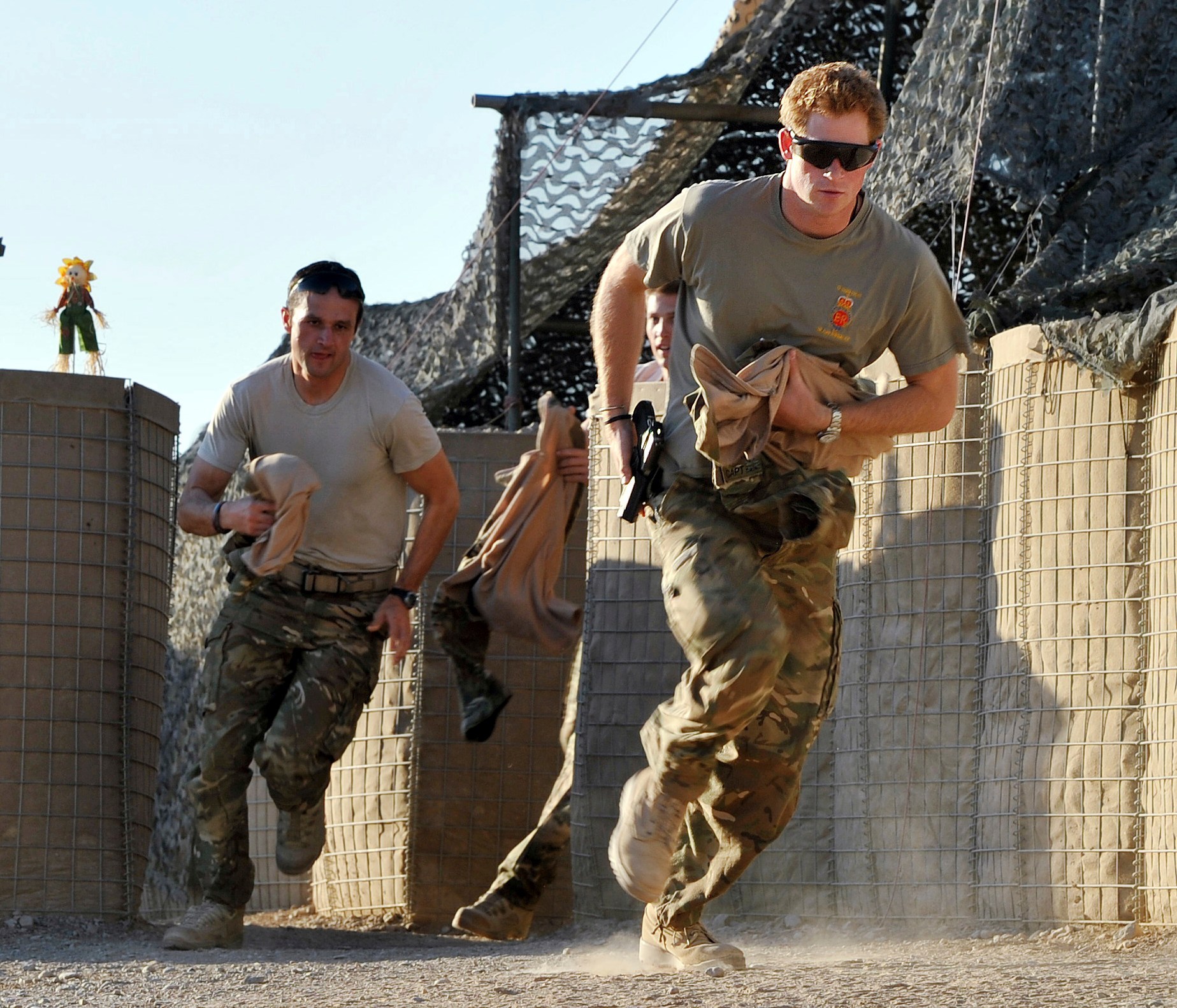 Prince Harry and fellow pilots running during a 12-hour shift at Camp Bastion.