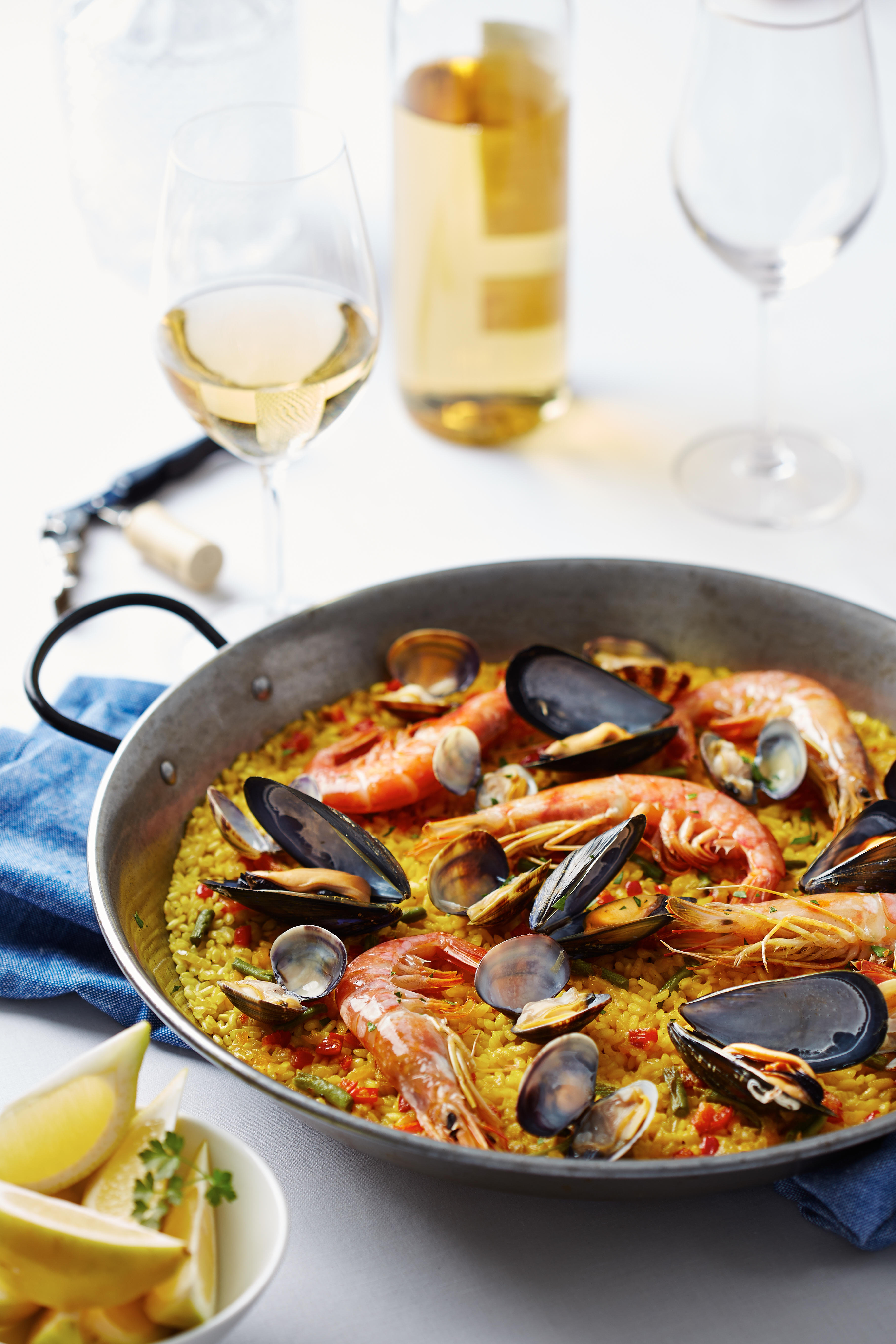 Seafood paella in a traditional pan.