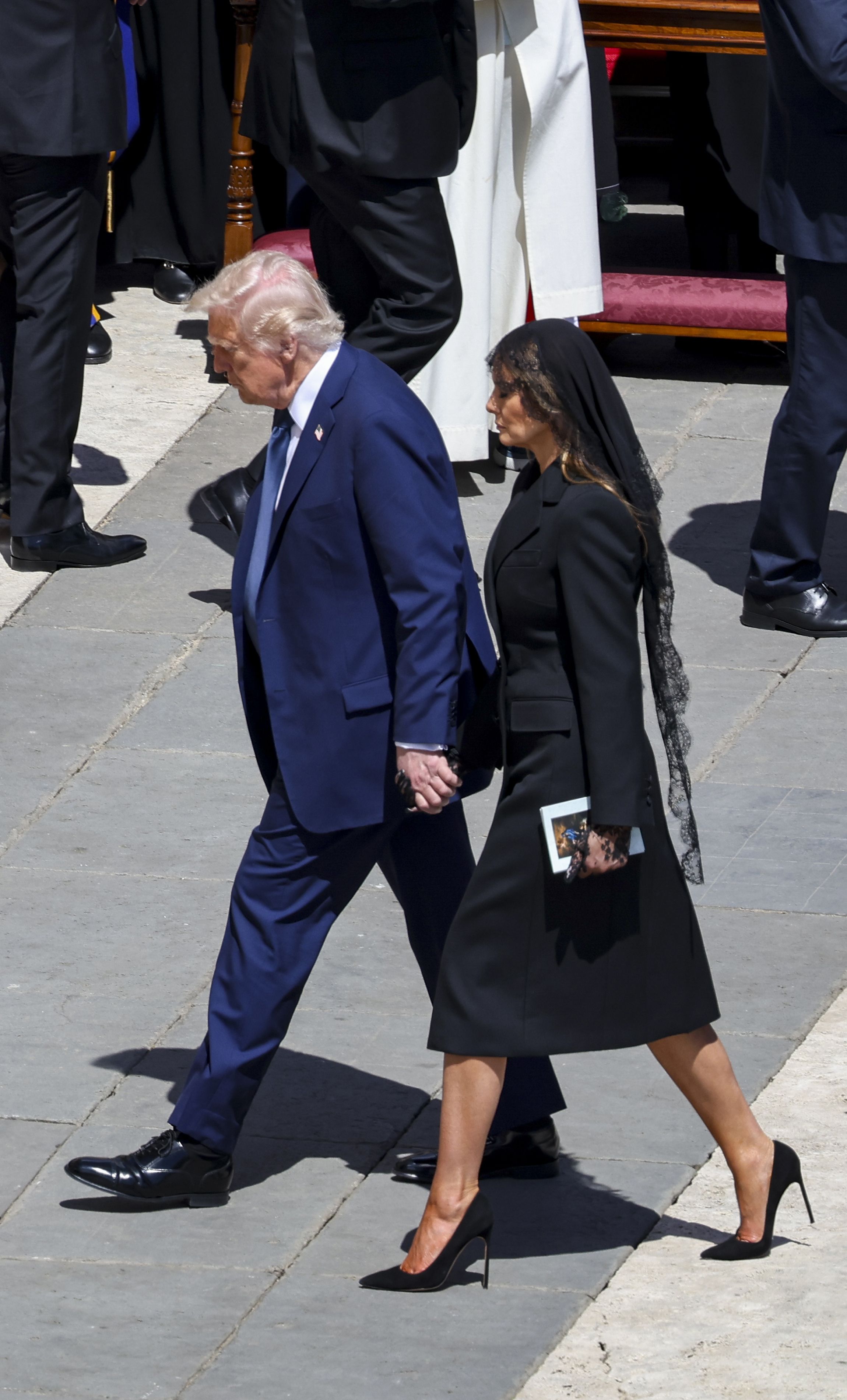 Donald and Melania Trump leaving Pope Francis' funeral.