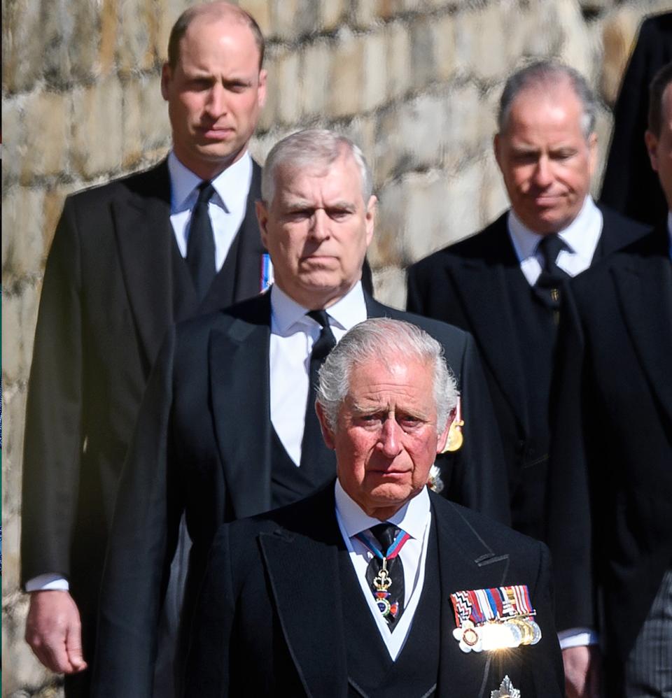 King Charles, Prince William and Prince Andrew walking in a row at Prince Philip's funeral.